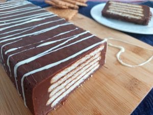 No-Bake Chocolate Biscuit Cake on a wooden board