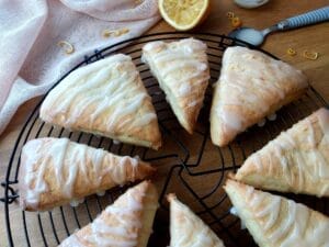 Close up of baked lemon scones on a wire rack