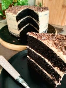 Sliced three layered chocolate cake.