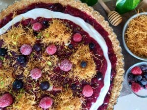 Kataifi Berry Tart on a black platter.